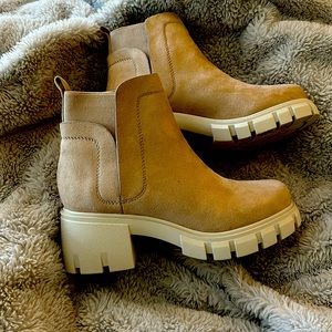 Tan booties.  Only worn one time. Excellent used condition.  Smoke free home.